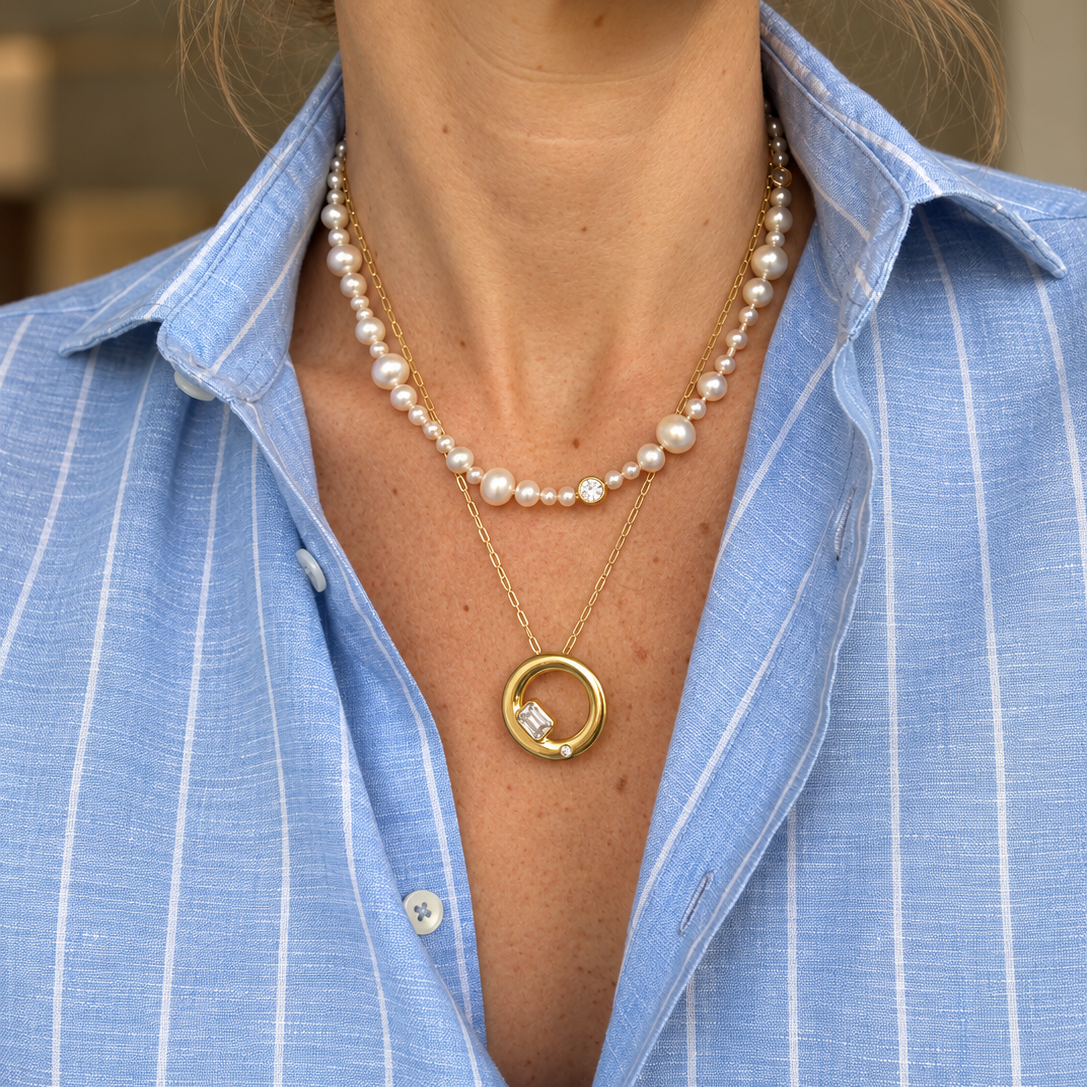 Chloe Necklace in moissanite layered with a pearl necklace