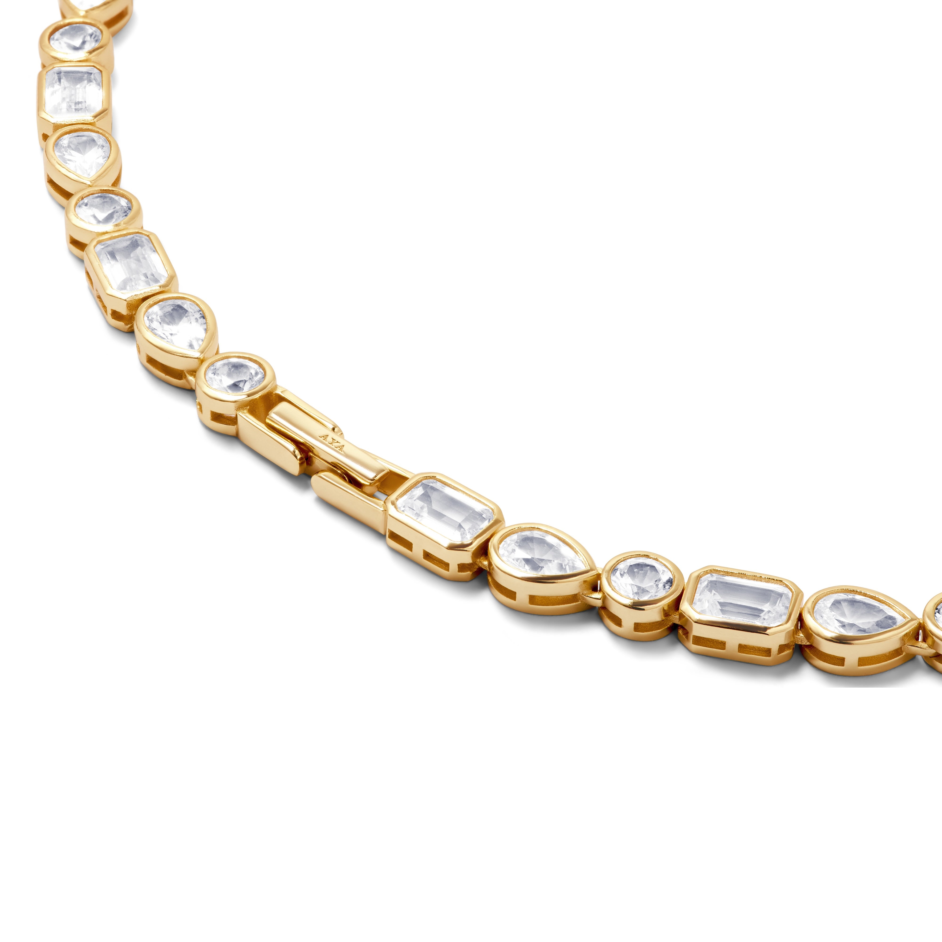 Gold bracelet with clear gemstones on a white background