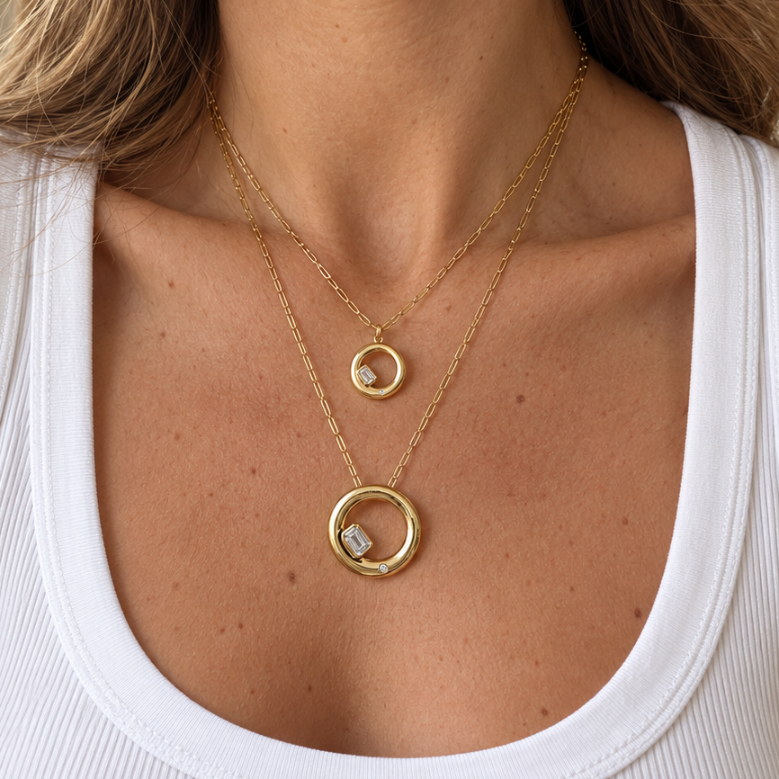 Mini Chloe Necklace and Chloe Necklace in moissanite, layered with a white ribbed tank